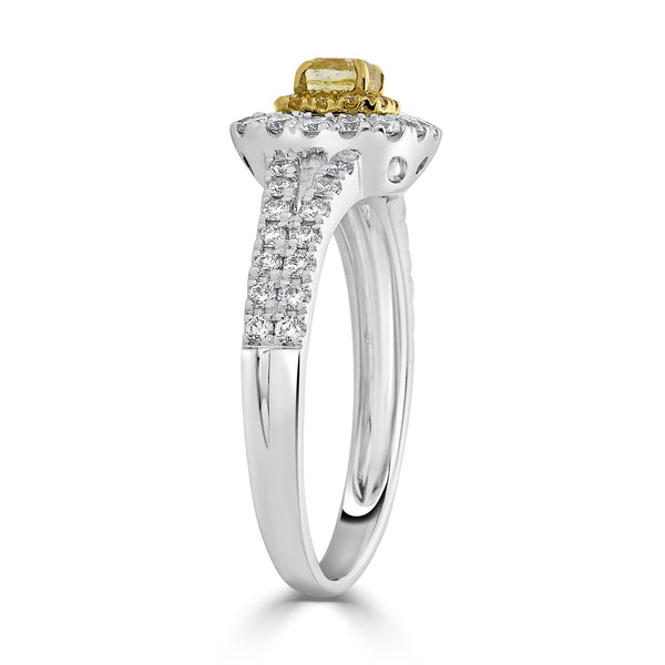 0.31ct Yellow Diamond ring with 0.57tct accent diamoidns set in 18K two tone gold