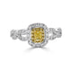 0.27ct Yellow Diamond ring with 0.47tct accent diamonds set in 18K two tone gold