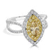 0.40tct Yellow Diamond ring with 0.75tct diamond accents set in 14K two tone gold