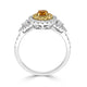 0.26ct Orange Diamond ring with 0.61tct diamond accents set in 14K two tone gold