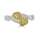 0.29tct Yellow Diamond ring with 0.54tct diamond accent set in 18K two tone gold