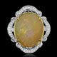 11.71ct Opal Ring with 0.29tct Diamonds set in 14K Two Tone Gold