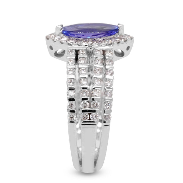 1.05ct Tanzanite ring with 0.69tct diamonds set in 14K white gold